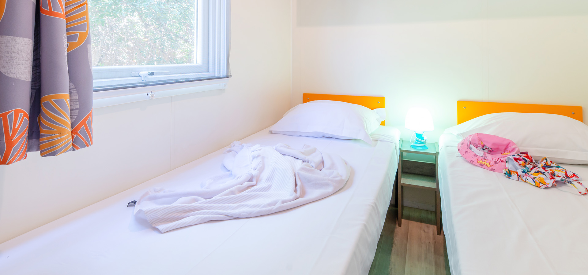 Camping san damiano bungalow declik chambre enfants