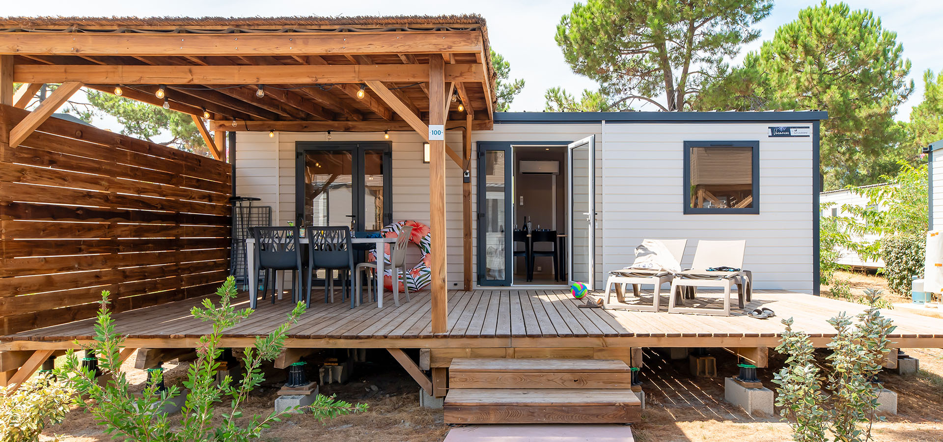 Camping san damiano bungalow giraglia terrasse jardin